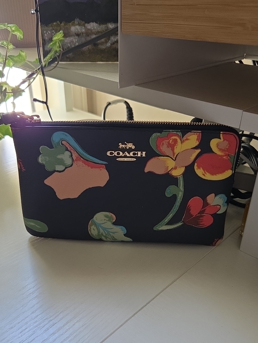 COACH Navy Floral Zip Wristlet with Multicolor Blooms